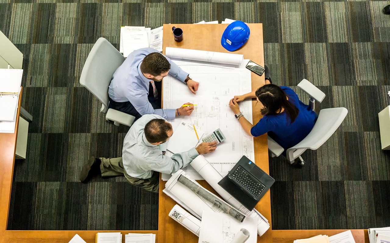 Group of business advisors circled for a meeting